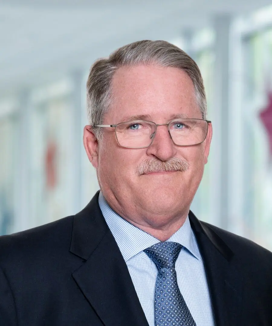 Middle-aged man in suit and tie